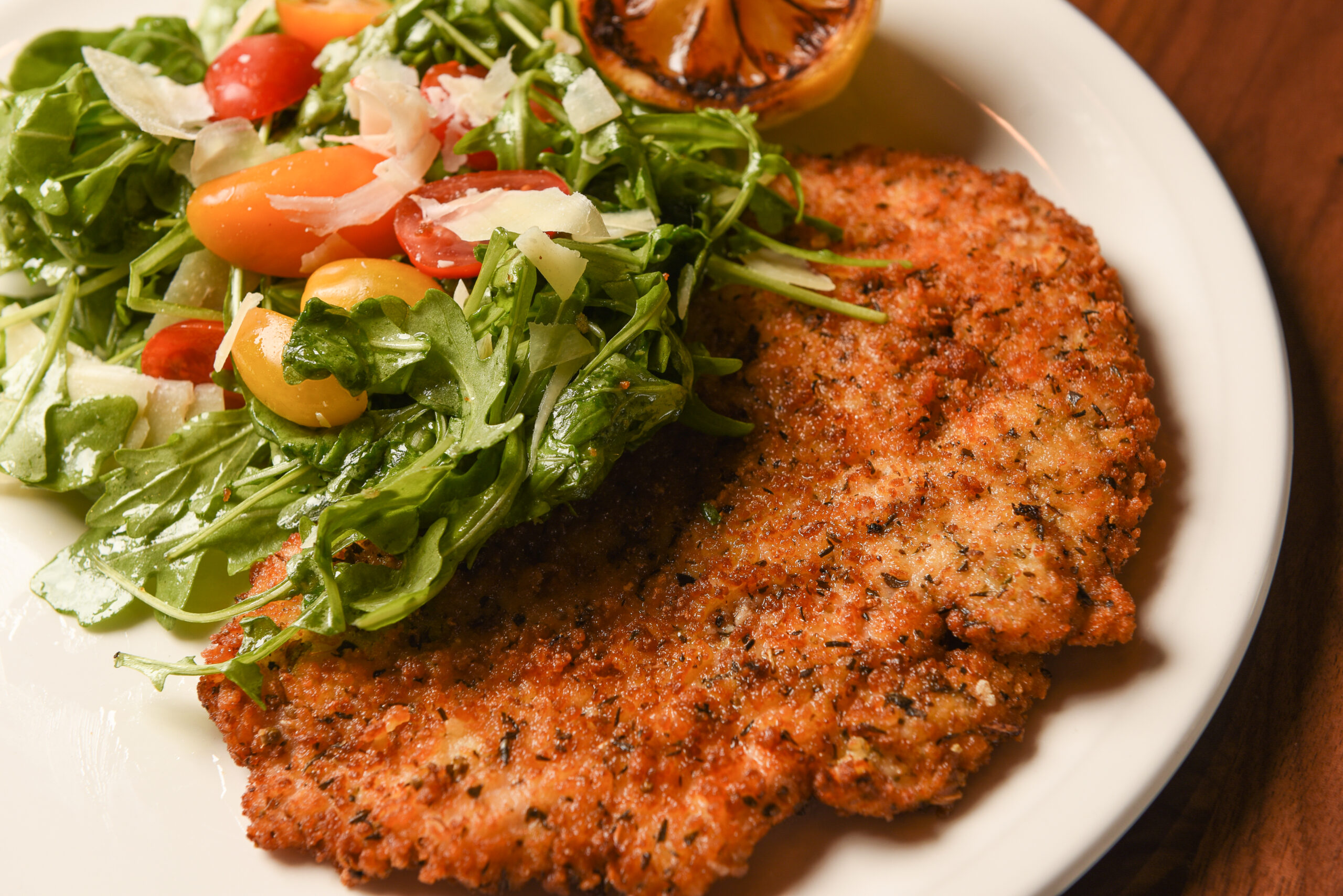 Chicken Milanese with arugula salad scaled